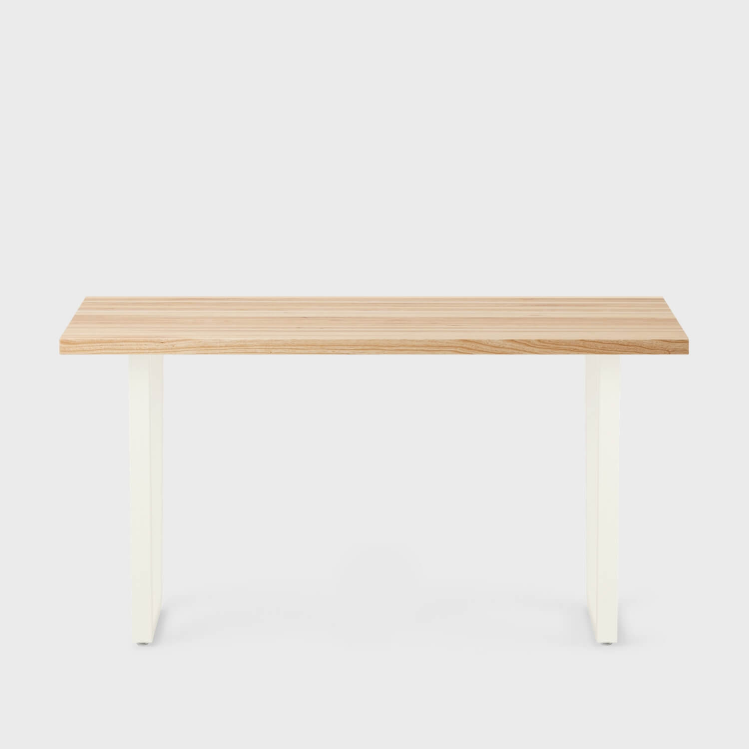 Wooden desk with white tapered legs