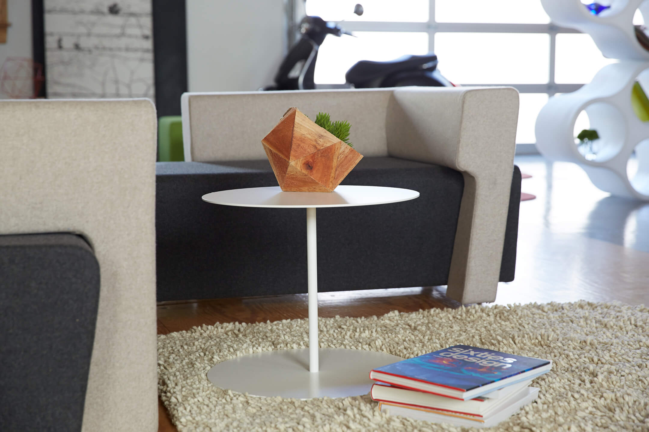 Haworth Giulio Cappellini Designers small round table near office couch