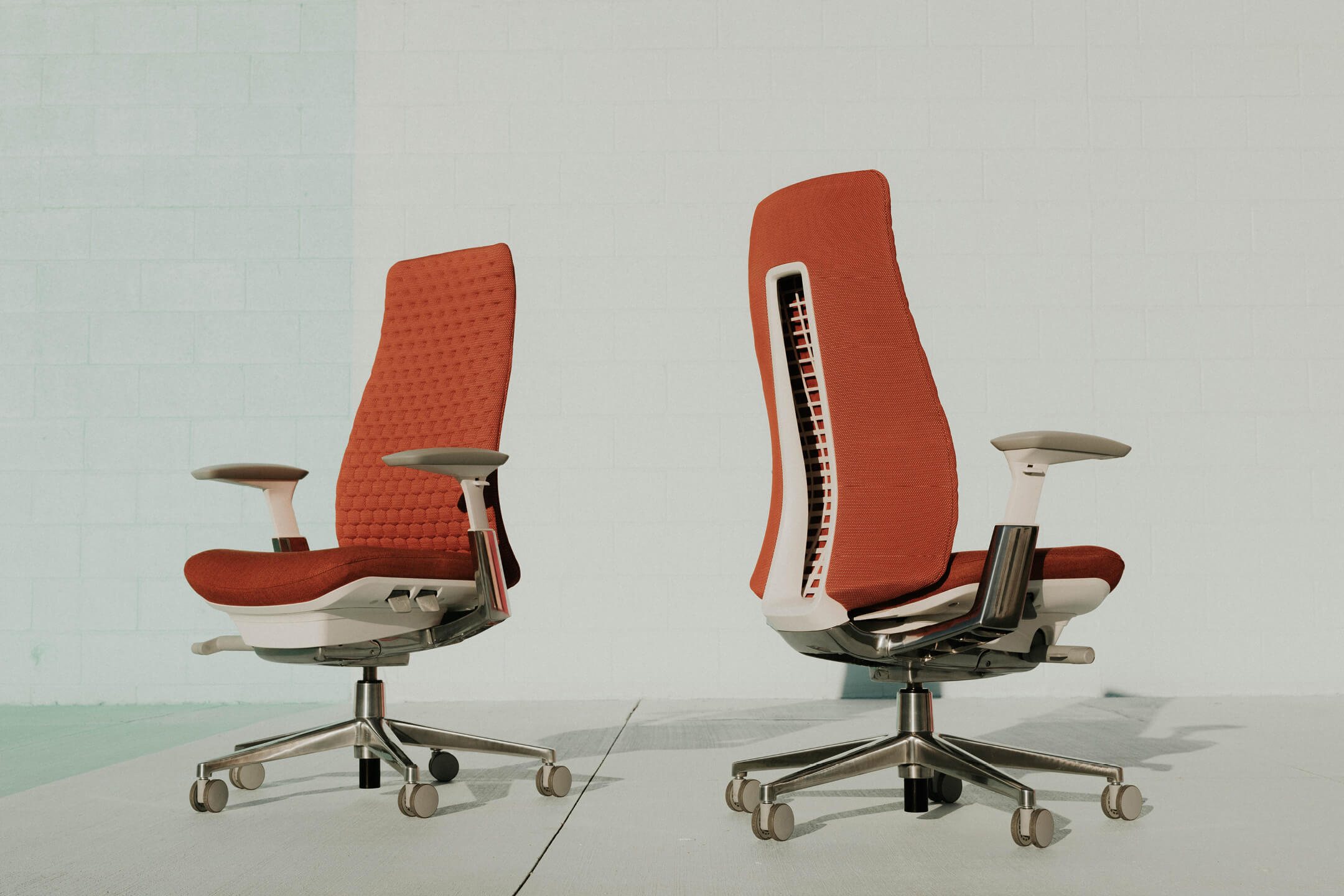 Haworth Design Studio Designer orange fern chair