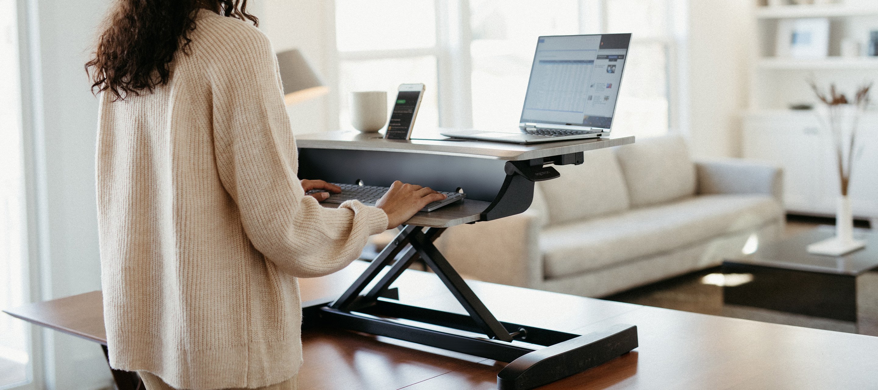 Haworth Ergotron sit - stand workstations in a office view 4