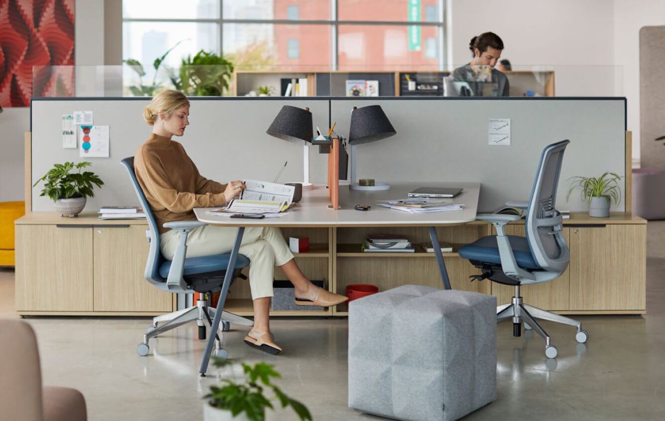 Individual workspace featuring soij office chair with lumbar support and the BuzziCube upholstered pouf. 