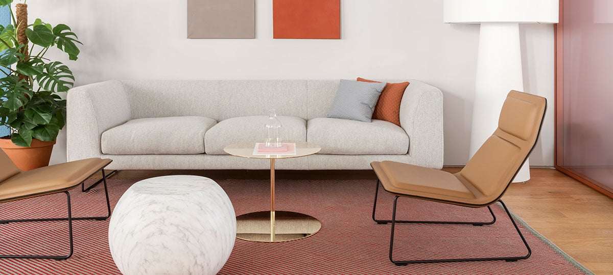 This corner, showcasing Elan sofa, Low Pad chairs, Bong and Gong Tables and Big Shadow lamp, all of them by Capellini, provides an inviting space for informal conversations.