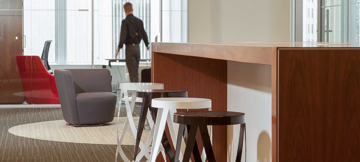 After more than 13 years in their existing offices, Cushman & Wakefield relocated their New England real estate team to a class-A Boston high-rise that could accommodate all employees on one floor. The new space is making a clear impact on the organization’s corporate culture of collaboration, teamwork and information sharing