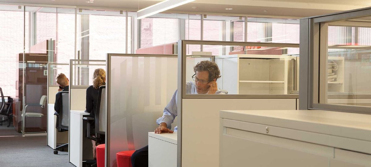 To create a more open, brighter workplace, lower panels with glass stackers surround workstations. This provides the separation needed for the individual, without compromising the light and open feel.