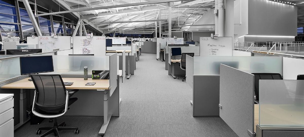 Individual workstations are located on the perimeter of the building to allow for heads down works. Each workstation also has a height adjustable work surface to allow for changes in posture throughout the day.