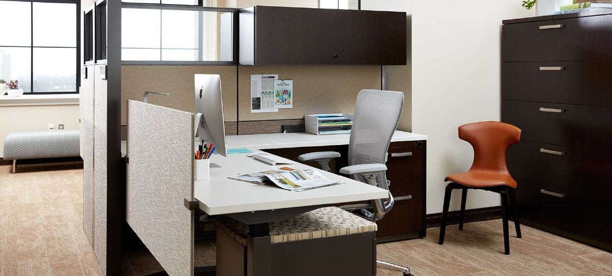 In addition to open collaboration areas, individual workspaces in the WMU Alumni Center offer flexibility to employees by incorporating adjustable desks.