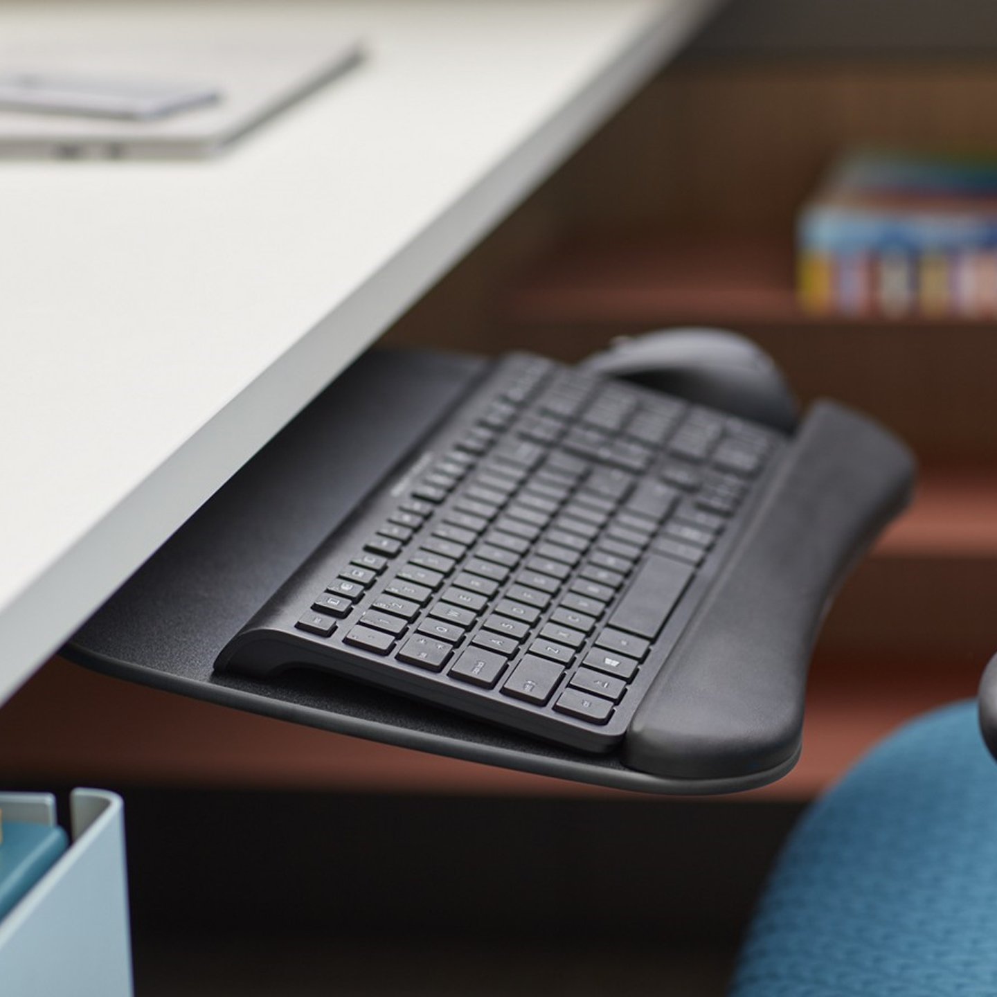 Haworth Technology Accessories with Keyboard and mouse attached to desk in a black color