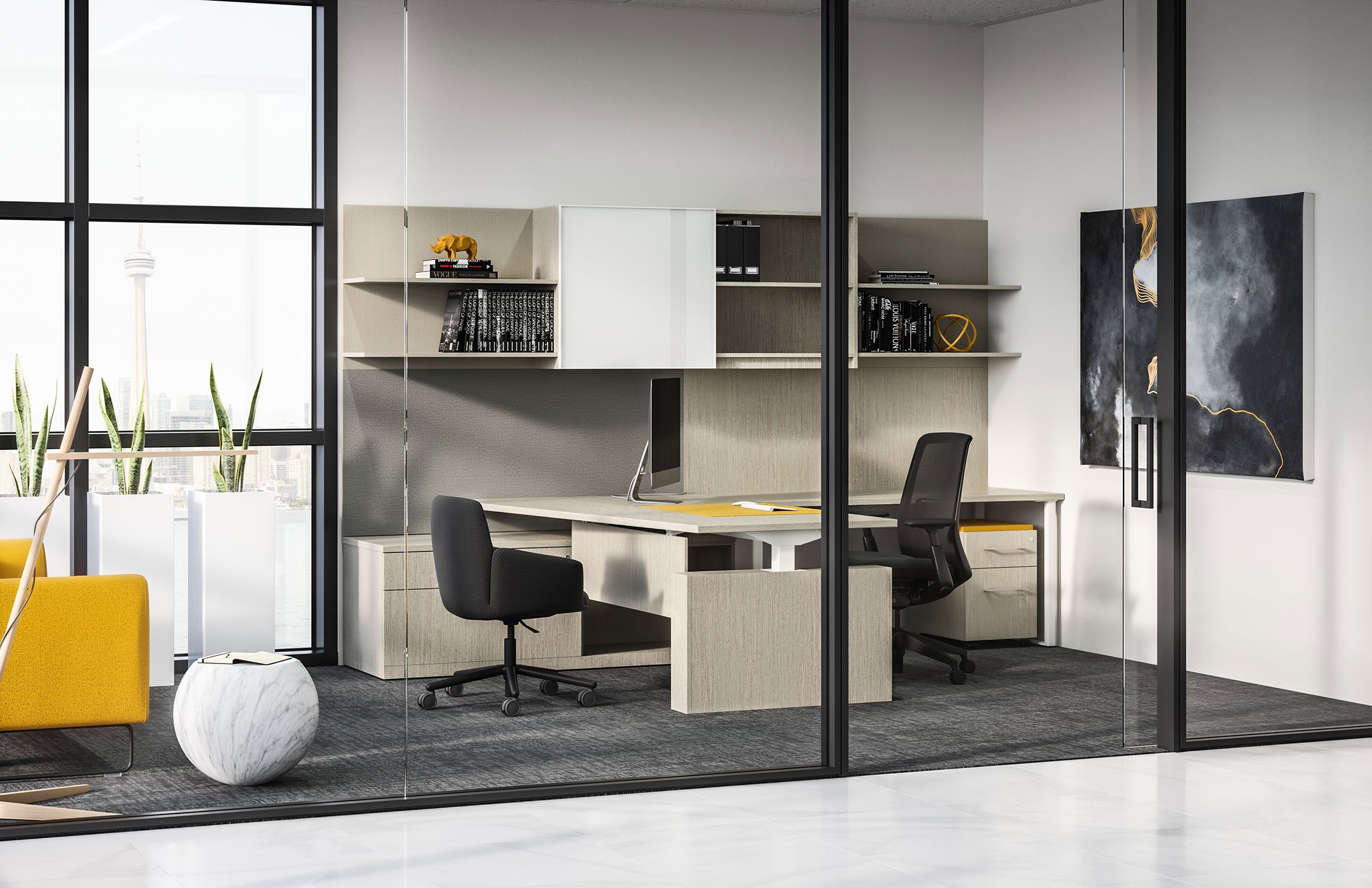 Haworth Masters Series Workspace in closed office space with glass walls with black chairs and apple desktop on height adjustable desk