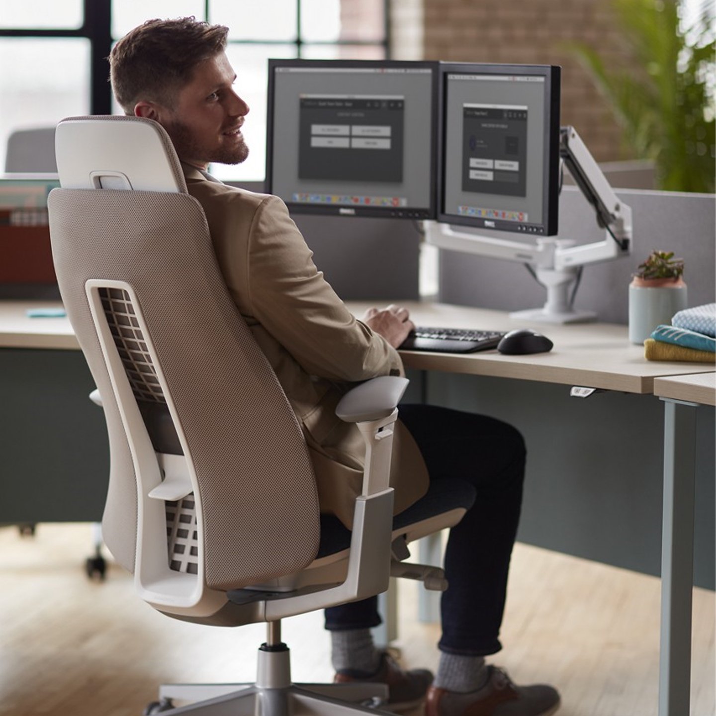 Haworth Fern Executive Task chair at a workstation in a office room 