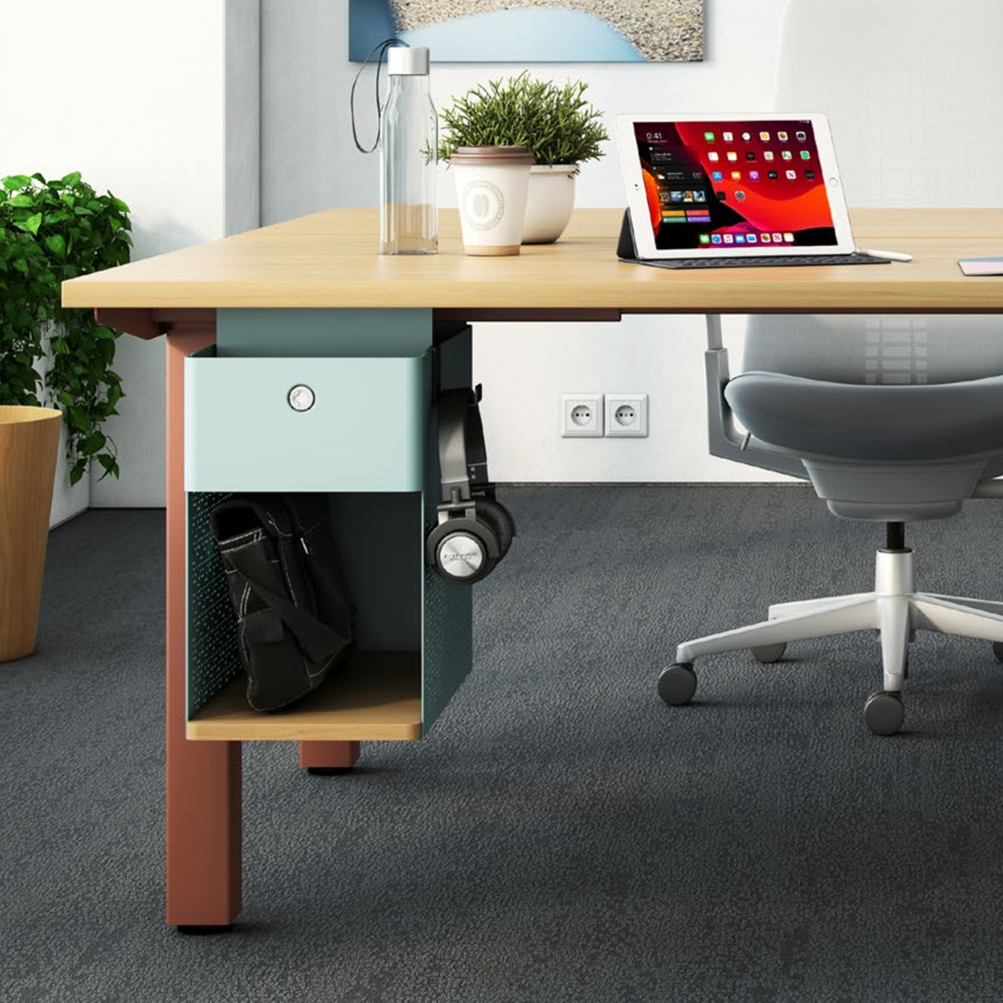 Active Components at individual workstation in orange with shelf and drawer under desk.