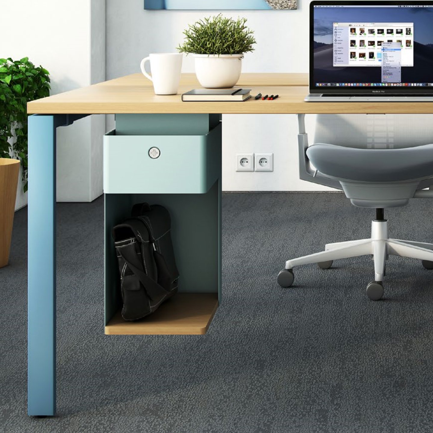 Active Components at individual workstation in blue with shelf and drawer under desk.
