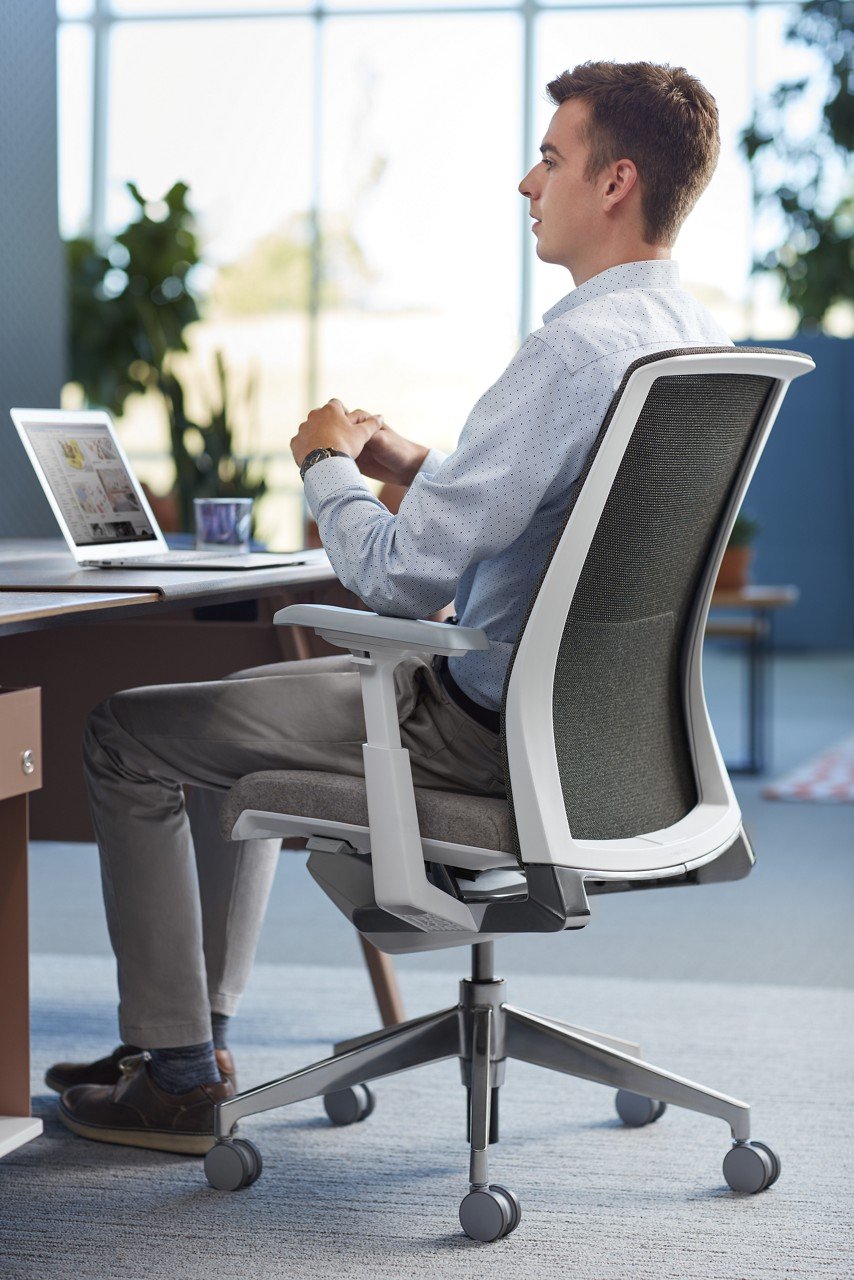 Haworth Very Task chairs in various colors and models in office spaces